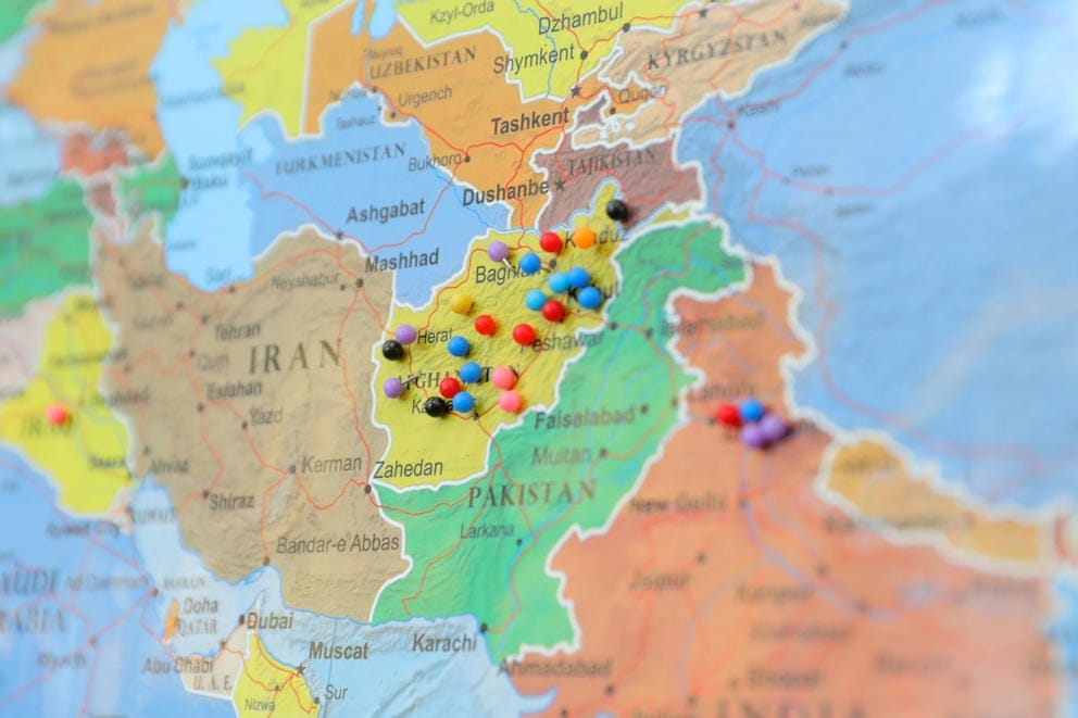 A map on the wall at Parkside Elementary shows pins where immigrant and refugee students are from. Many Parkside families are from Afghanistan.