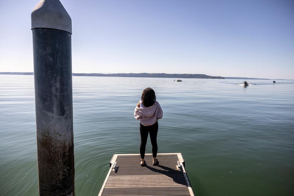 Hannah Power looks out over the Puget Sound by her home in Federal Way.