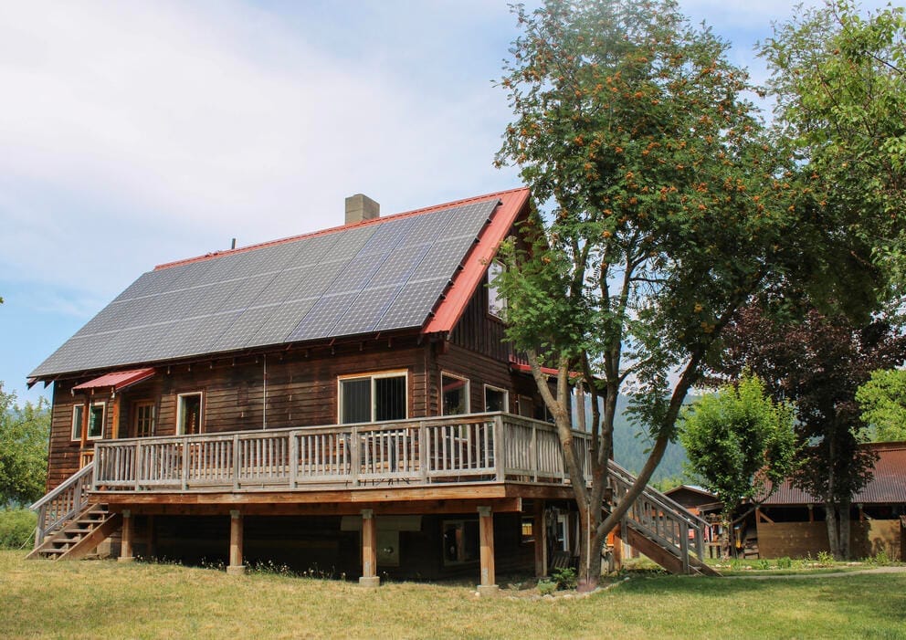 A wooden home in a field