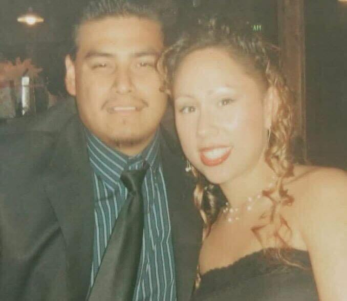 Two people pose for a photo