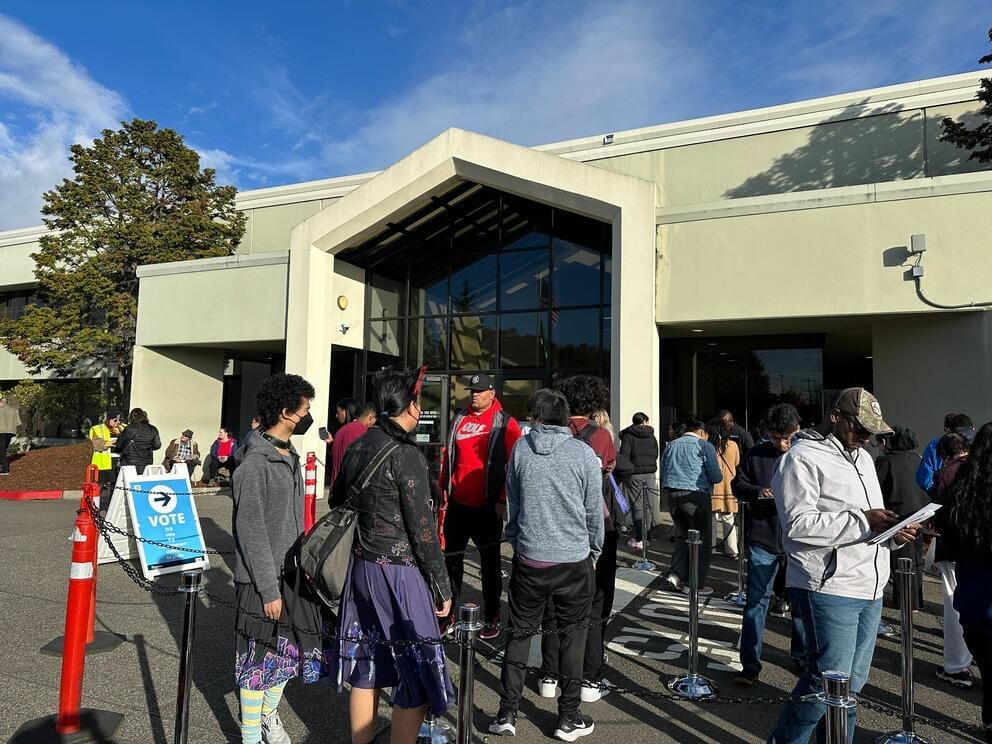 line of voters waiting at King County voting center in Renton