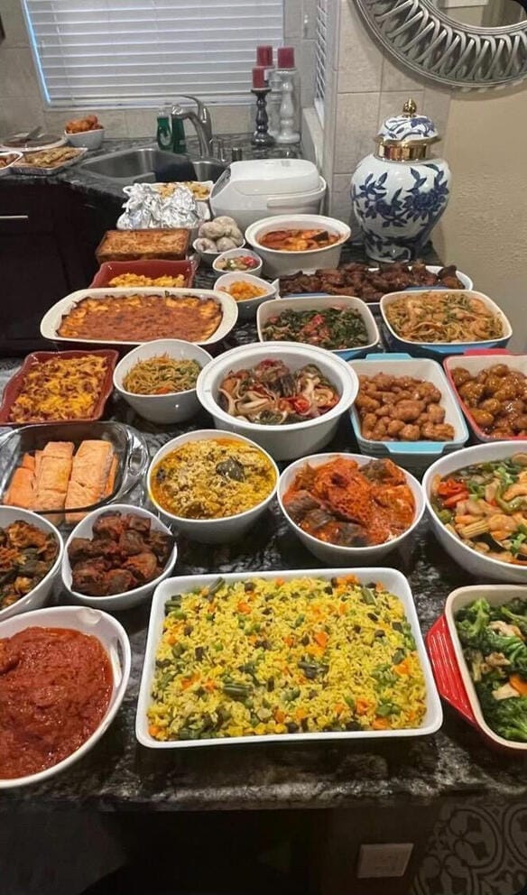 Rachel Izuagbe, a Nigerian-American in Lacey, said her family’s Thanksgiving last year included coconut riuce, moi moi (wrapped in foil in the top left), pounded yam (wrapped in plastic), mac and cheese, shrimp, chicken wings, collard greens, noodles, mashed potatoes with bacon, onion crisps and cheese, Nigerian fish dishes, salmon, egusi soup, stew, orange chicken, liver, Nigerian fried rice and broccoli. (Photo courtesy of Rachel Izuagbe)
