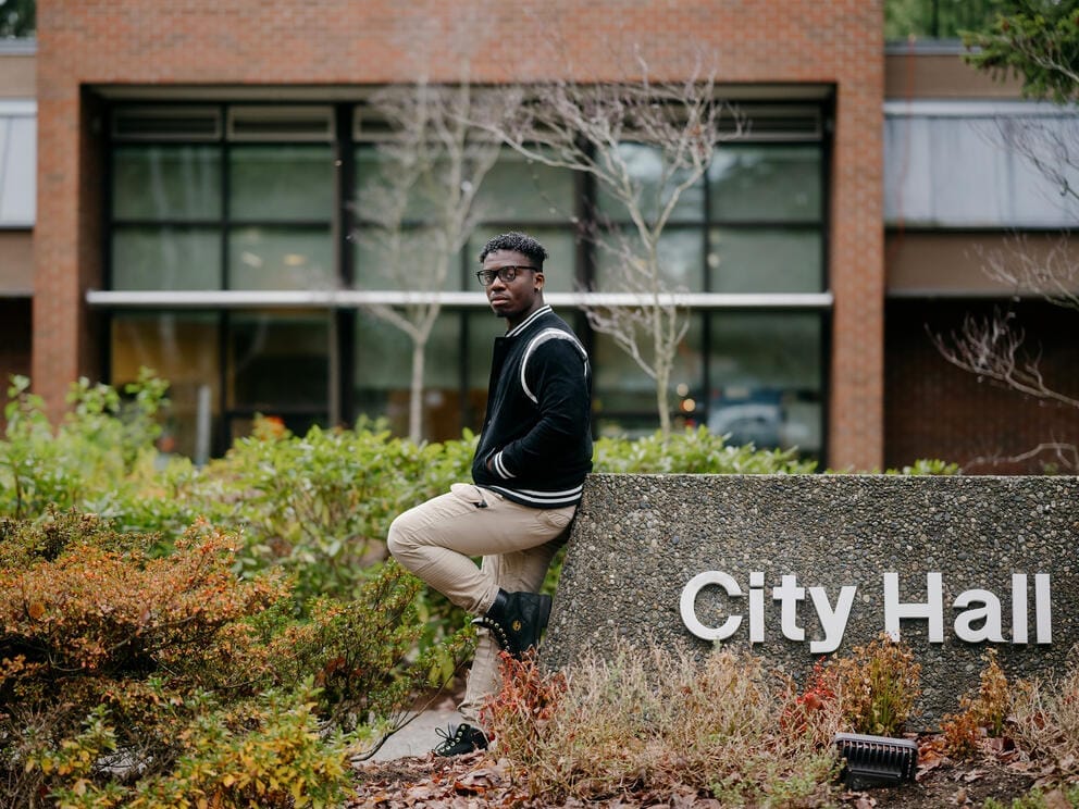 Lynnwood City Councilmember Josh Binda, 25, poses for a portrait outside Lynnwood City Hall.