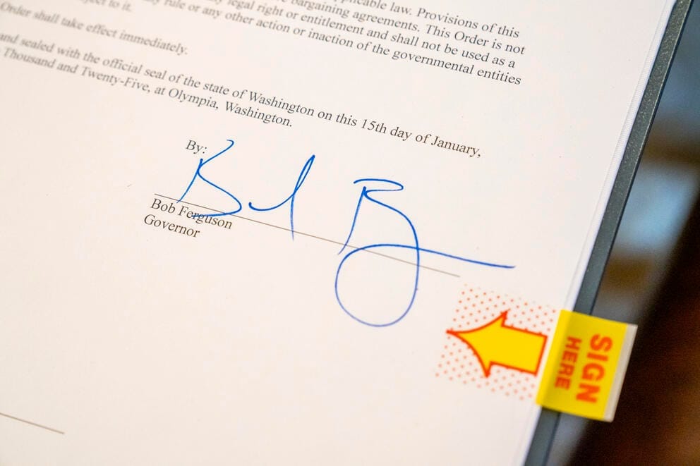 Bob Ferguson's signature is visible on a document dated Jan. 15, 2025