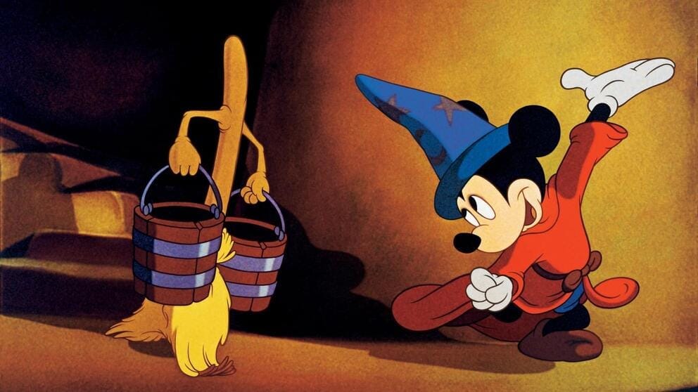 cartoon image of mickey mouse and a mop