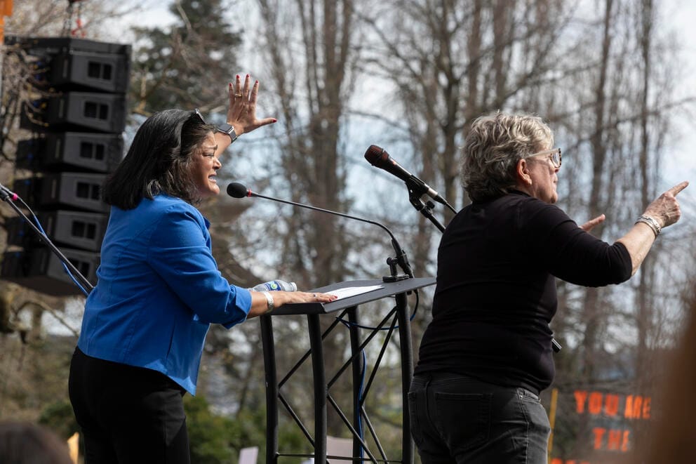 Rep. Pramila Jayapal addresses a crowd onstage