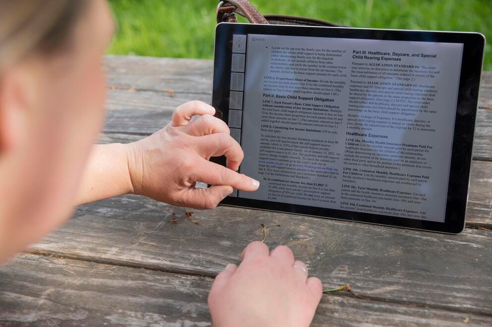 close up shot of finger scrolling on ipad