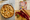 A baked pie on the left and a cutting board with rhubarb on it on the right