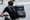 A man on a bicycle wearing an Uber eats delivery backpack