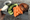 A bagel, lox and cream cheese on a board