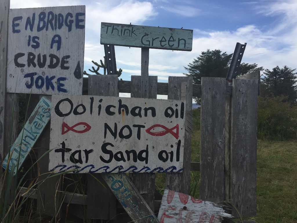 a sign that reads Oolichan oil not tar sand oil
