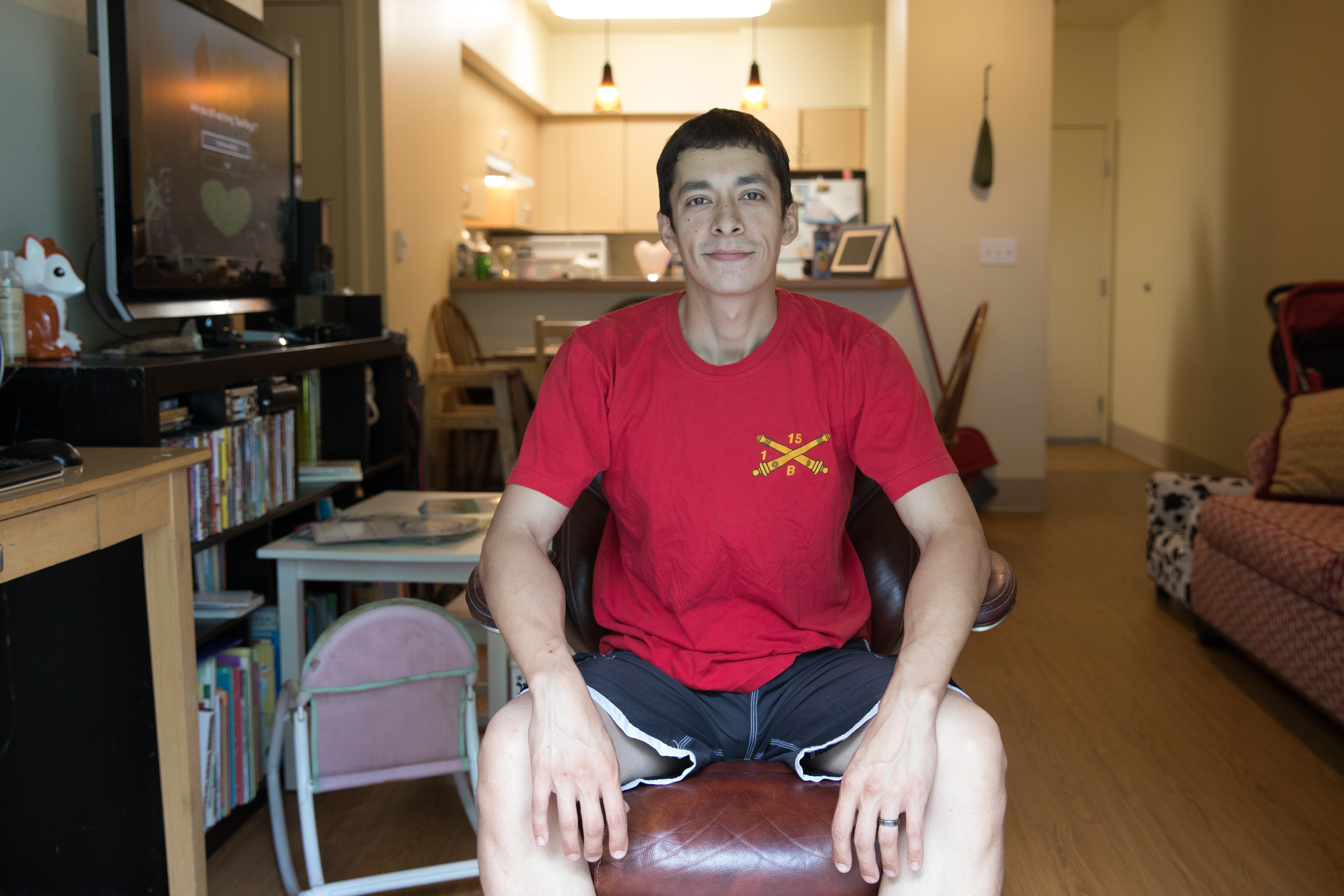 Benjamin Bourg photographed at Compass Housing apartments in Renton, July 11, 2018. (Matt M. McKnight/Crosscut)