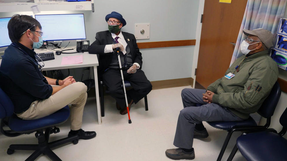 Doctor with patient and interpreter