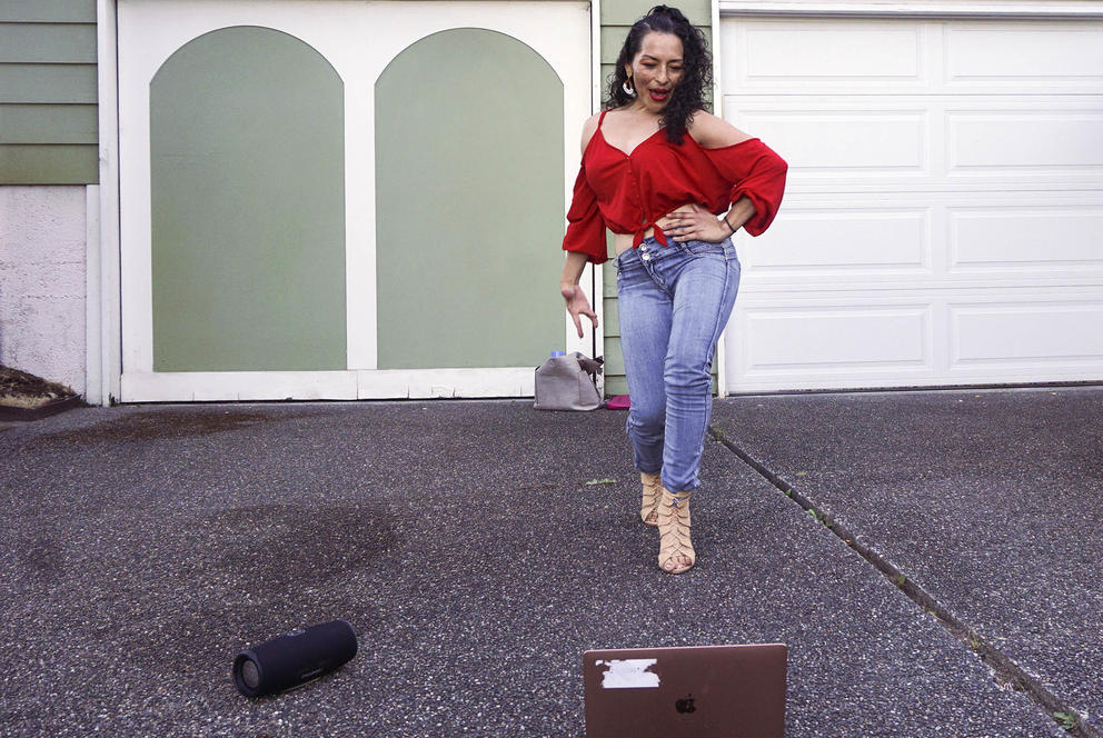 Vanessa Villalobos with a hand on her hip as she steps forward. 