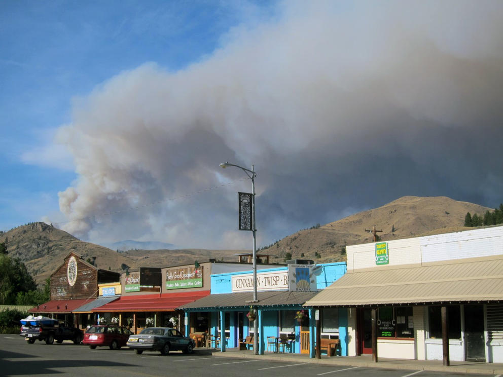 Smoke in the distance, over a downtown