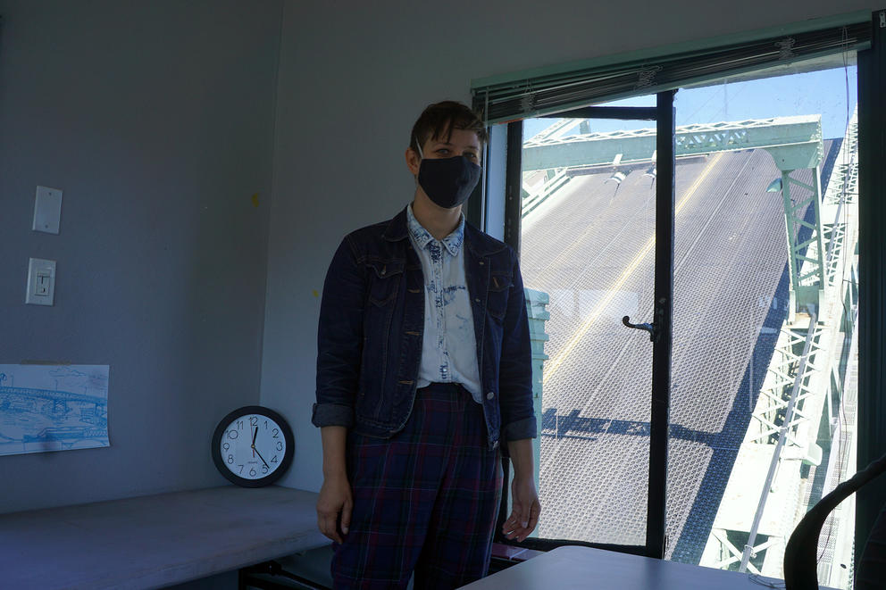 E.T. Russian by a window with drawbridge opening up