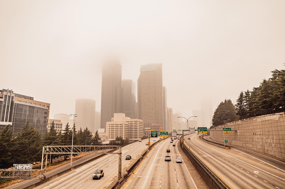 Seattle's downtown skyscrapers are partially obscured as thick, hazardous wildfire smoke