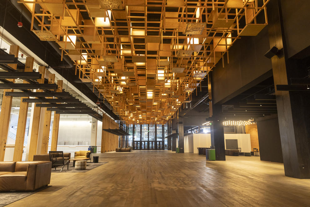 Interior room with wooden floor and wooden latticework chandelier