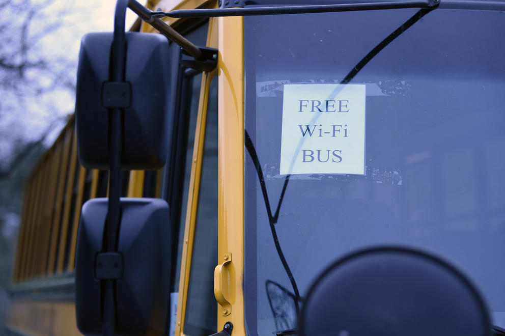 a paper reading wifi on a school bus