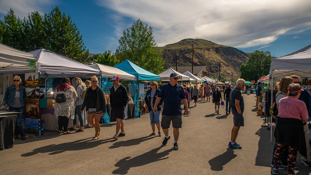 People walking at an outdoor market