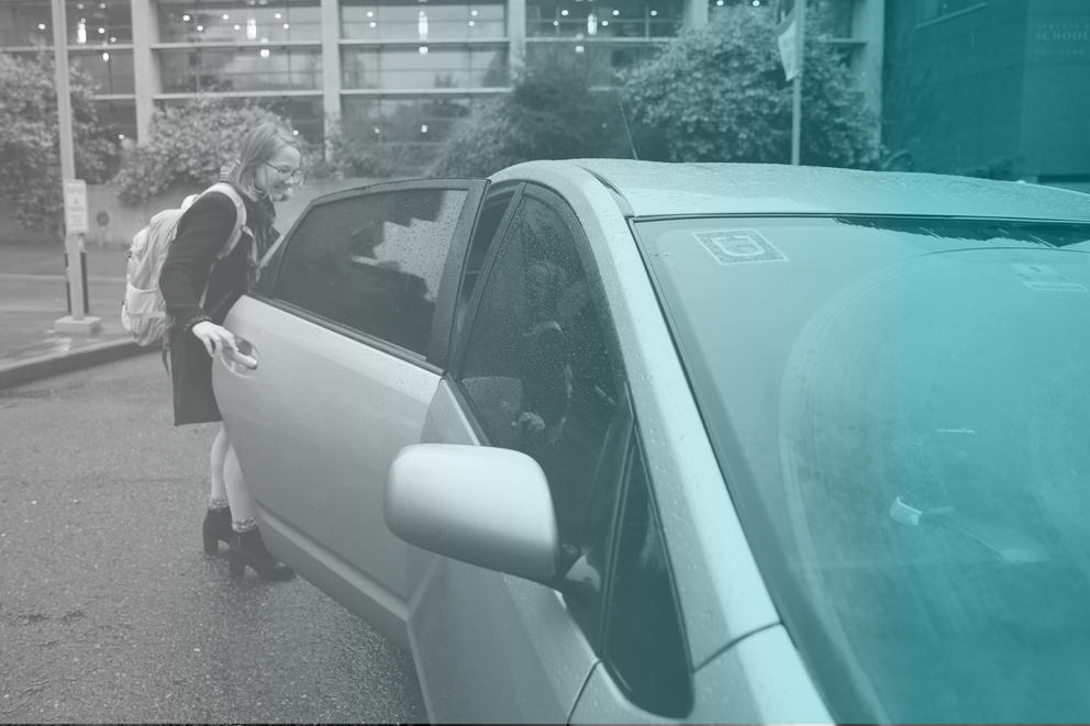 woman entering an Uber