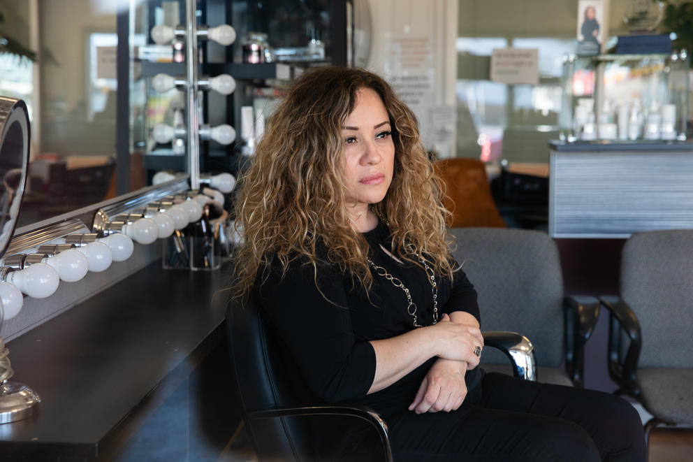 hairstylist sitting in her chair