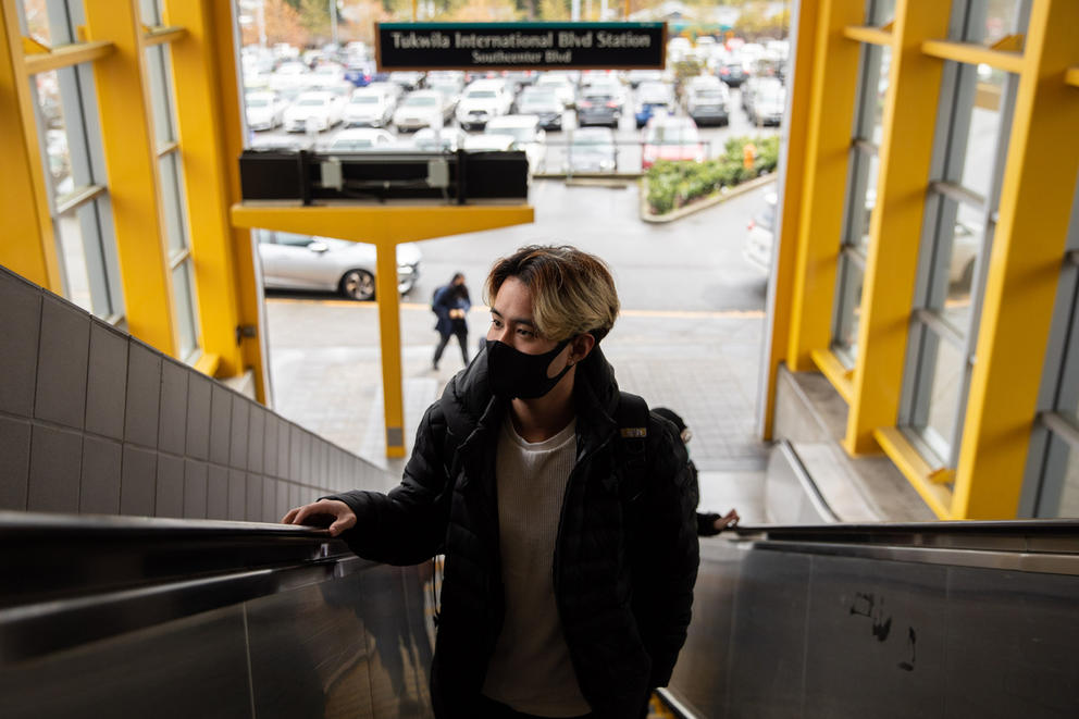 A person on an escalator