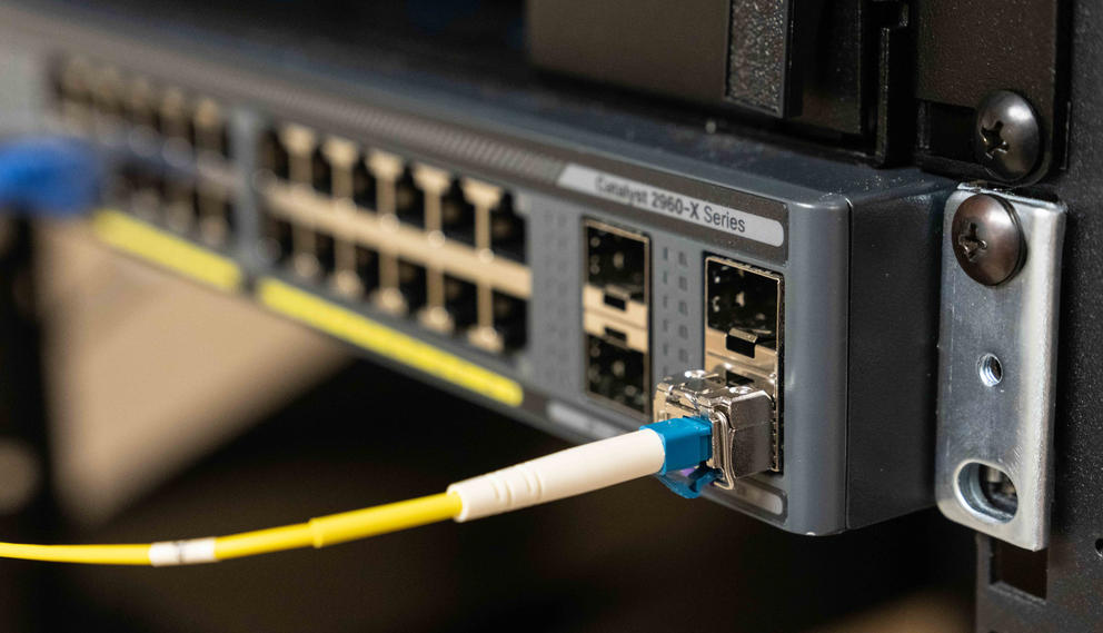 A yellow cable runs into a row of inputs.