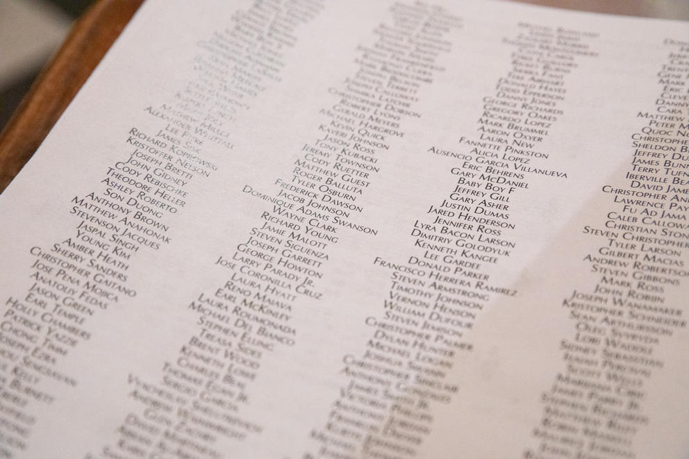 a photo of the program from a catholic mass