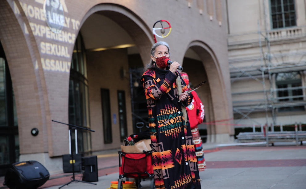 Yvonne Swan standing in front of the Tom Courthouse.