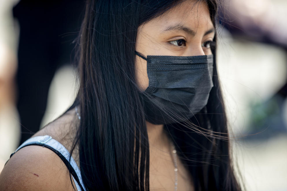 young woman with a mask