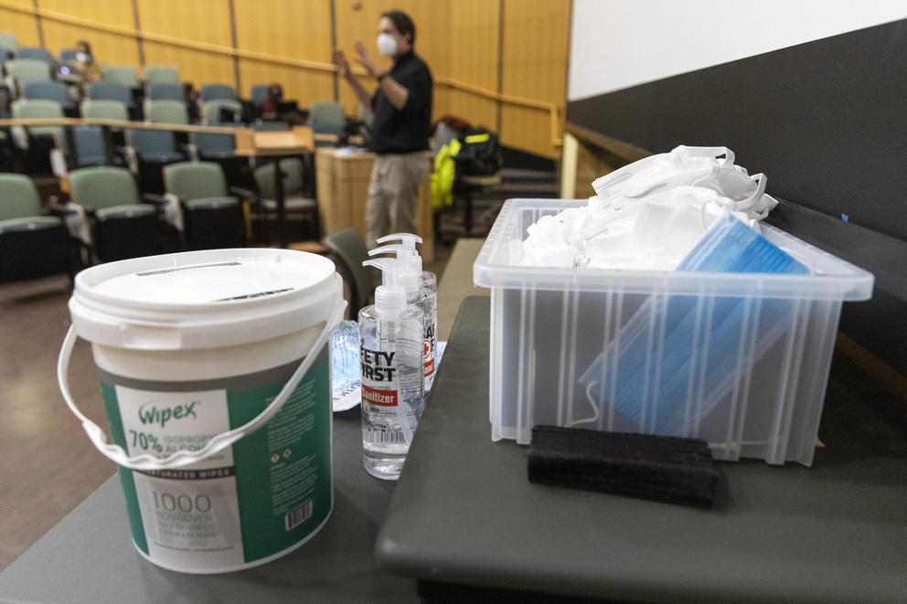 A container of masks on a table