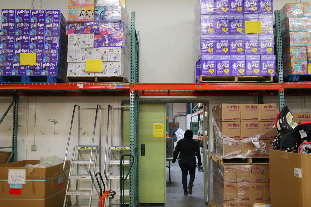 Donated diapers line the shelves at WestSide Baby in White Center.