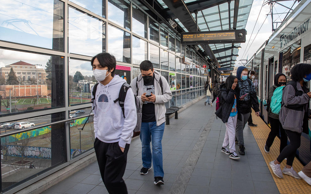 People waiting for a train in the Mount Baker light rail station