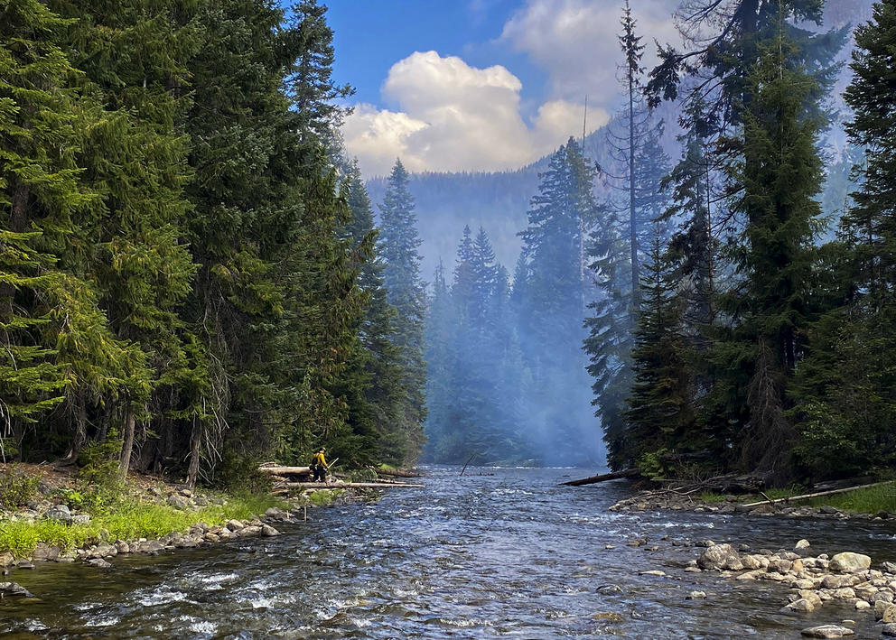 firefighter by river