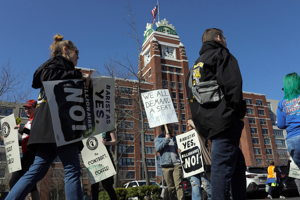 Starbucks Workers United union members and supporters protest outside Starbucks Headquarters