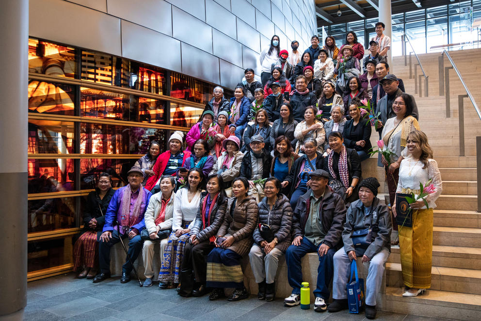 Cambodian American community members take a photo in City Hall