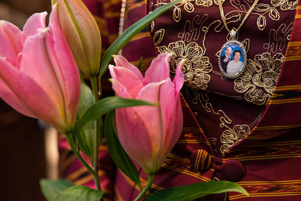 Sopheap Ven's pendant displays a photo of her parents