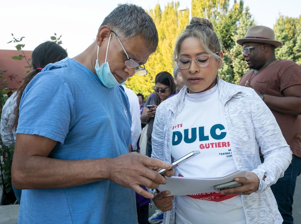 Volunteers looking at a voter canvasing plan