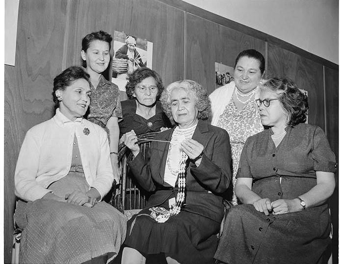  Martha John, center, demonstrates how to make a traditional shell to Leona Lyness, Dorothy Lombard, Ella Aquino, Pearl Warren, and Hazel Duarte