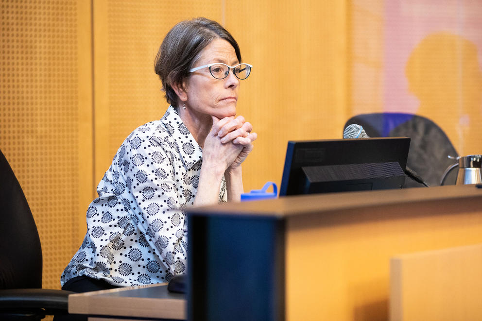Seattle councilmember sara nelson sits behind the dais