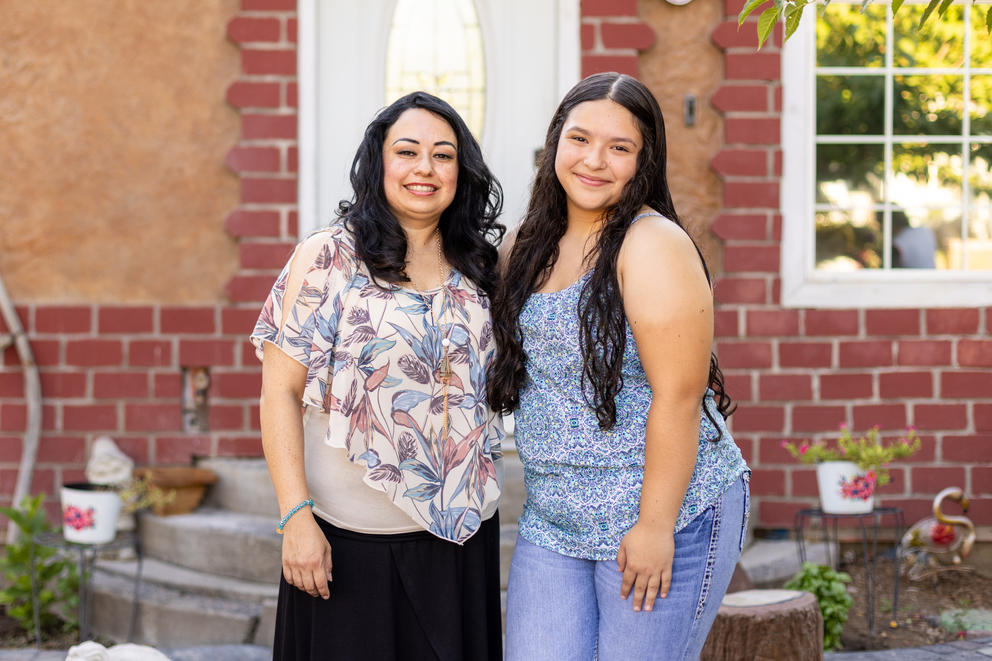 Silvia Zarate and her daughter Daniela outside their home