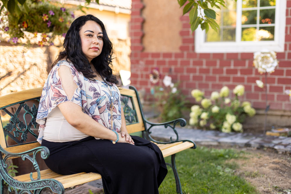 Silvia Zarate poses for a portrait outside of her family’s home 