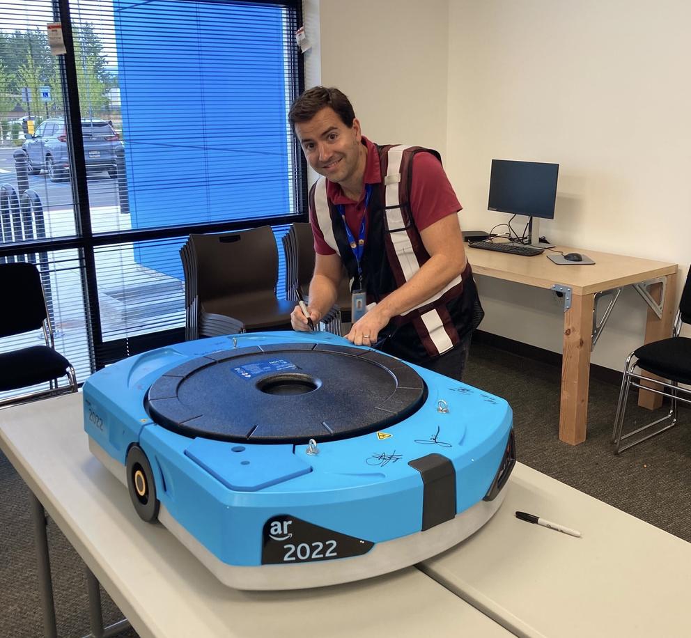 Bruno Arnal smiles in an Amazon vest