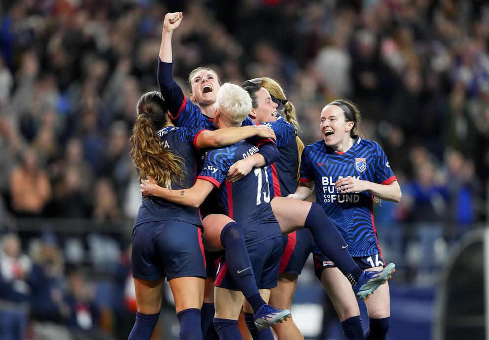OL Reign players celebrate Veronica Lasko’s goal against Angel City FC