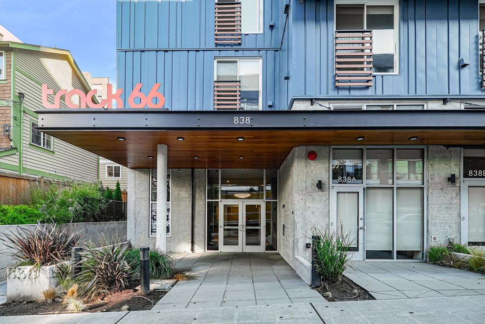 The walkway to a modern apartment complex