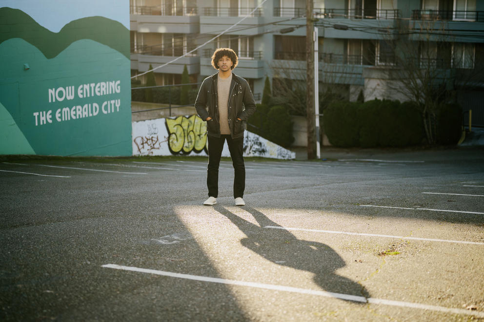 Garin Peyton stands in a parking lot