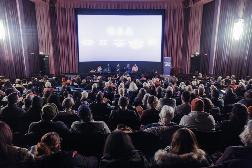A crowd sits at the Origins Season 2 Lost at Sea premiere