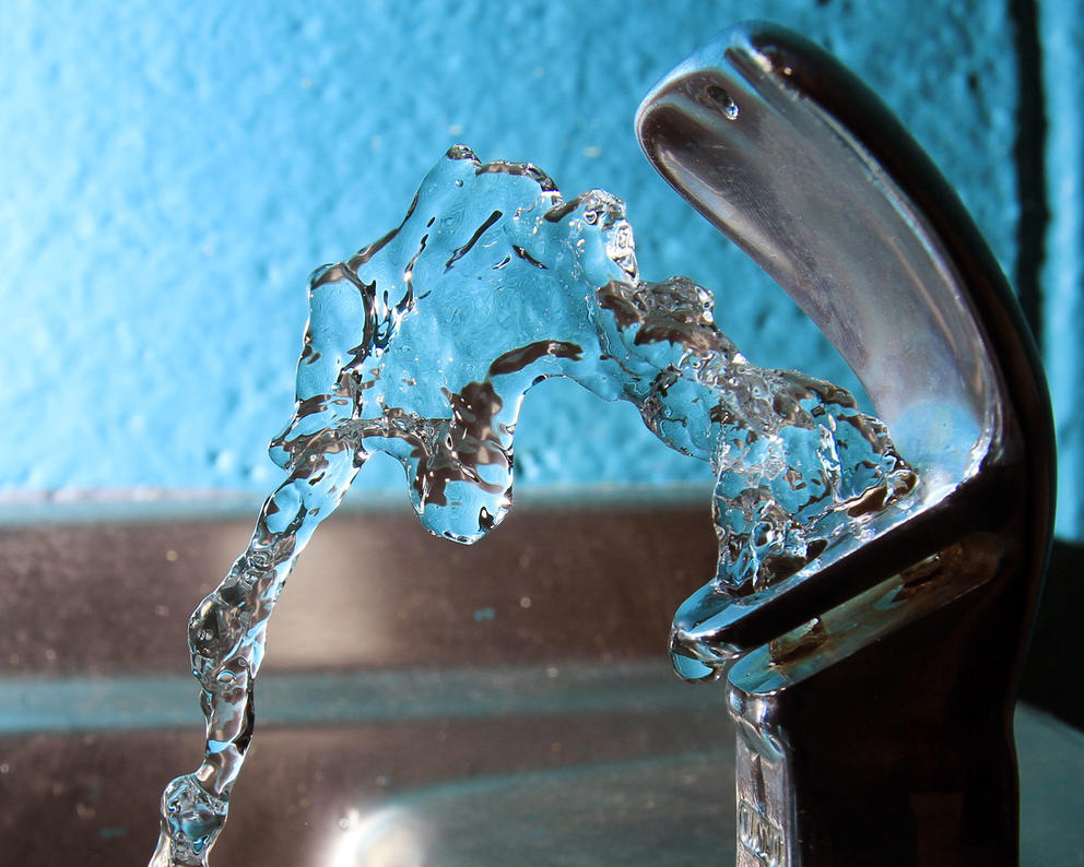Water spouts out of a drinking fountain