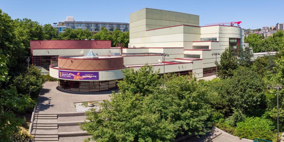 photo of the rounded exterior of a large theater building